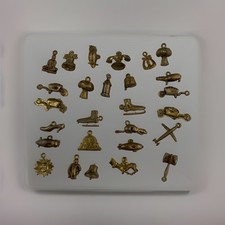 Lot of 27 1950 s Metal Over Plastic Cracker Jack Prizes