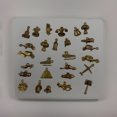 Lot of 27 1950 s Metal Over Plastic Cracker Jack Prizes