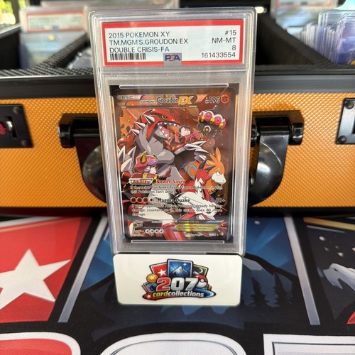 Team Magma's Groudon-EX graded PSA 8 for sale on eBay