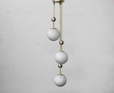 Elegance The Timeless Beauty of the Brass Milky Ball Chandelier