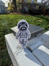 Out of this World! Cute Raccoon Astronaut Sticker - Space Adventure Vinyl Decal