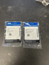 2 packs of Ford factory original 2x seals 7L1Z-7J227-A New! 4 seals total