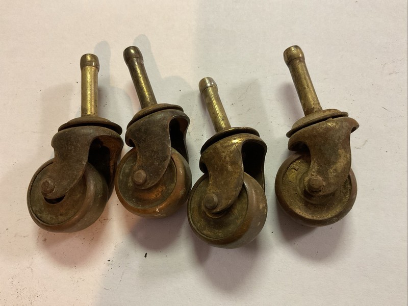 Set Of Four Vintage Antique Matching Casters. Brass Wheel 1” . Steel Shaft. Base