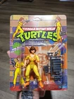 TMNT Teenage Mutant Ninja Turtles April O’Neil Orange Stripes Unpunched 1990 MOC