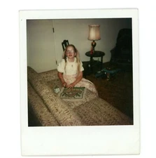 Girl working on Latch hook rug - vintage snapshot found color  photo