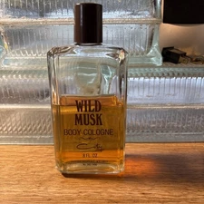 Vintage Coty Pfizer Wild Musk 8 Ounce Bottle of Body Cologne. 60%.