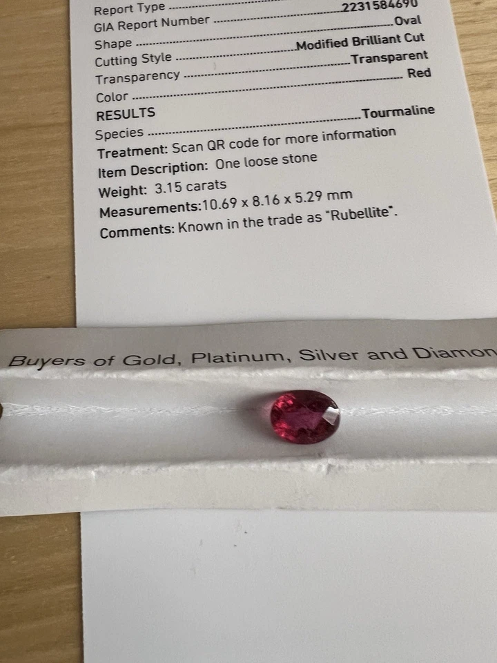 Informe de turmalina gia de 3,15 quilates Foto 3 de 4