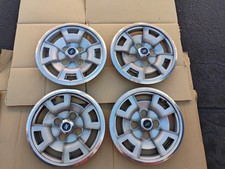 4 1977-78 Datsun 280z S30 Oem Wheel Covers With Z Center Caps Still Intact 4 1977-78 Datsun 280z S30 Oem Wheel Covers With Z Center Caps Still Intact