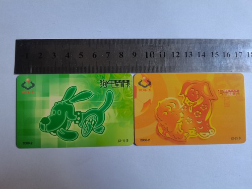 a pair China Dalian bus ticket-Souvenir Card-dog year-2006