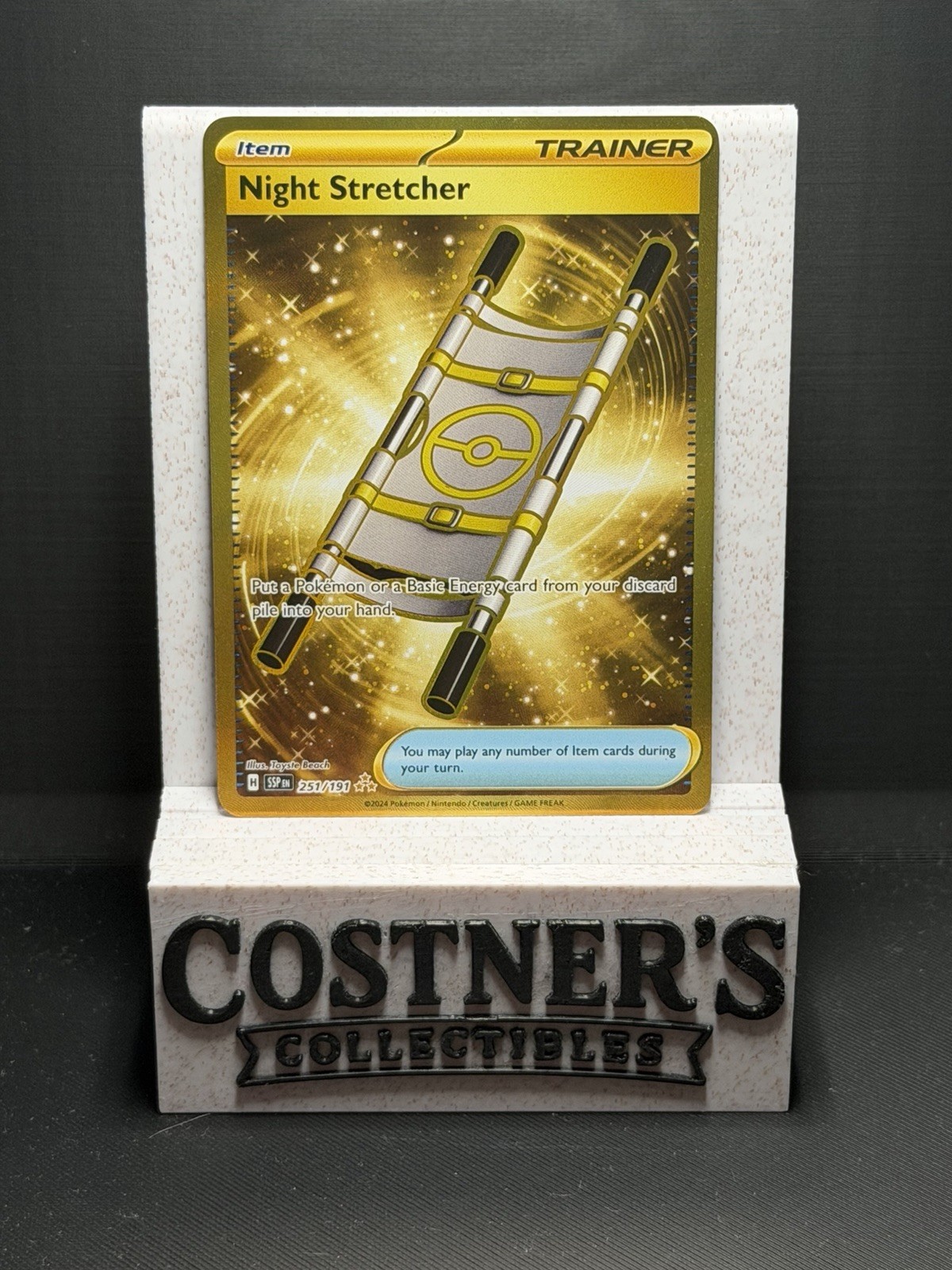 Night Stretcher 251/191 Gold Pokémon Sv08: Surging Sparks Holo