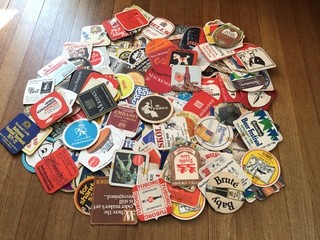 Job lot of over 150 unsorted beer mats