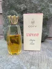 Vintage COTY L'Aimant eau de toilette ( edt ) 1.25 oz   65% full
