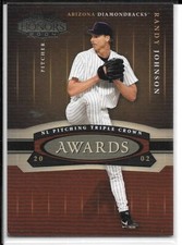RANDY JOHNSON SERIAL /2002 2004 PLAYOFF HONORS AWARDS A-25 AZ DIAMONDBACKS HOF