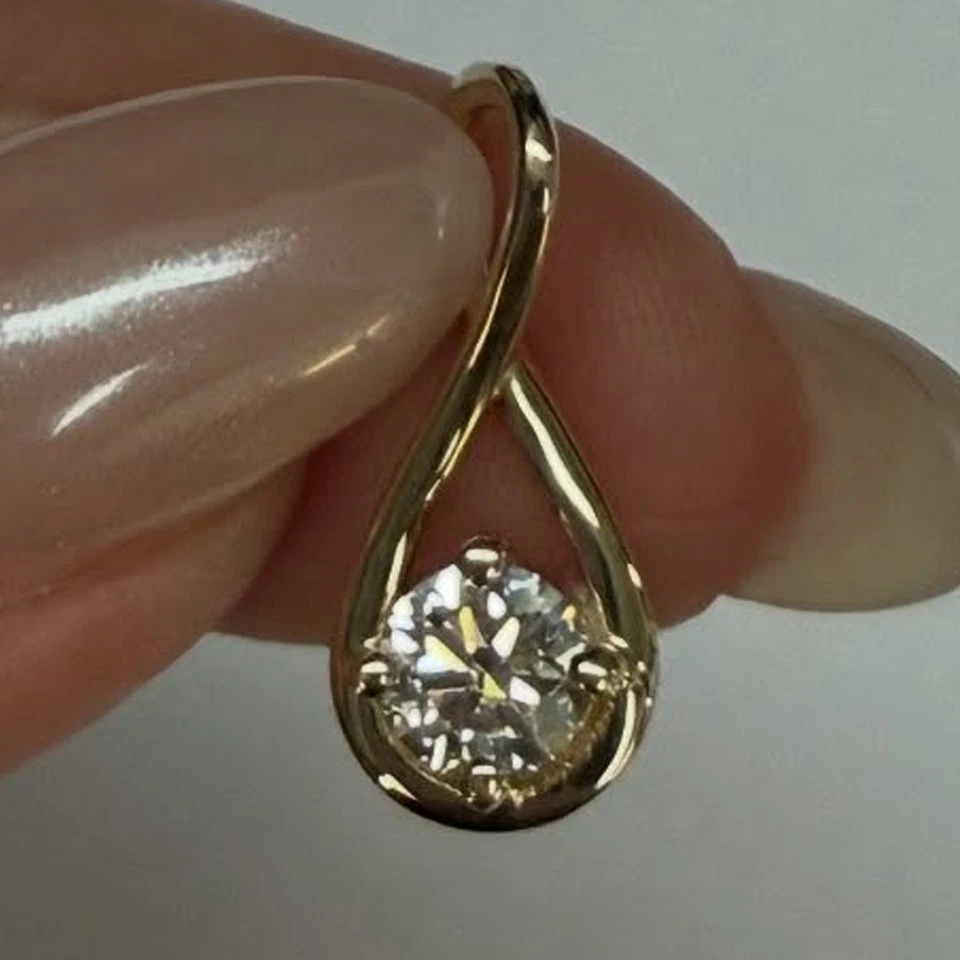 IGI 1.50Ct Round Cut E VS1 Lab Grown Diamond Infinity Pendant In 14K Yellow Gold - Image 2 of 4