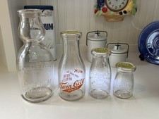 4 Vintage Milk Bottles With New Caps 1 Quart, 1 Pint, 1/2 Pint, 1/4 Pint