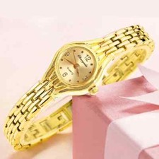 Reloj de pulsera de cuarzo elegante con purpurina en tono dorado para mujer