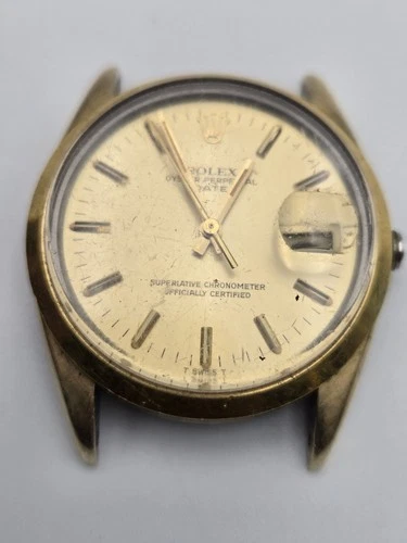 Vintage Rolex Oyster Perpetual Date wristwatch being sold for parts or repair