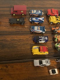 Vintage Micro Machines over 60 Mini Cars, Monster Trucks, Planes, and road.