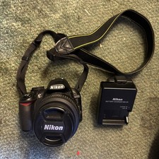 nikon d3100 camera complete with charger and lens