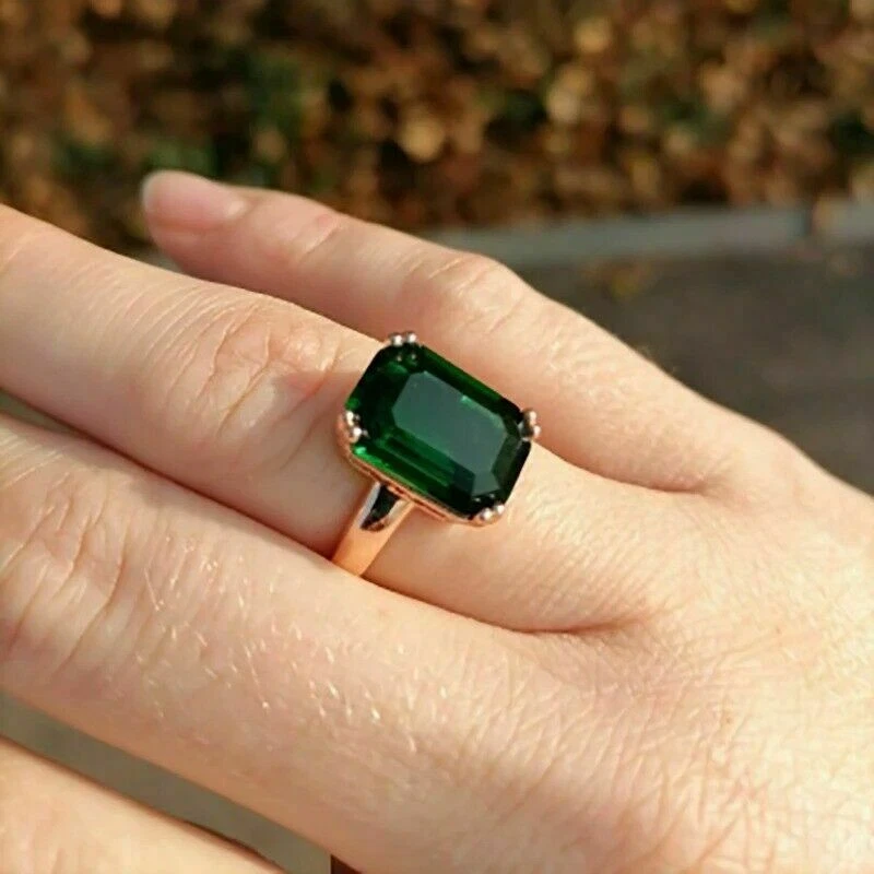 Rose gold ring with hotsell emerald