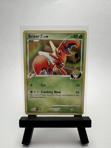 Pokémon Scizor 48/111 Rising Rivals Regular Uncommon. Moderately Played.