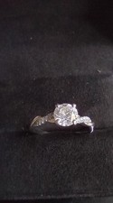 Ladies Platinum ring large natural 0.9 carat diamond with 14 small round diamond