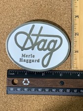 The Great Merle Haggard "Hag" Belt Buckle WHITE ENAMEL Very Strong 3.5 inches
