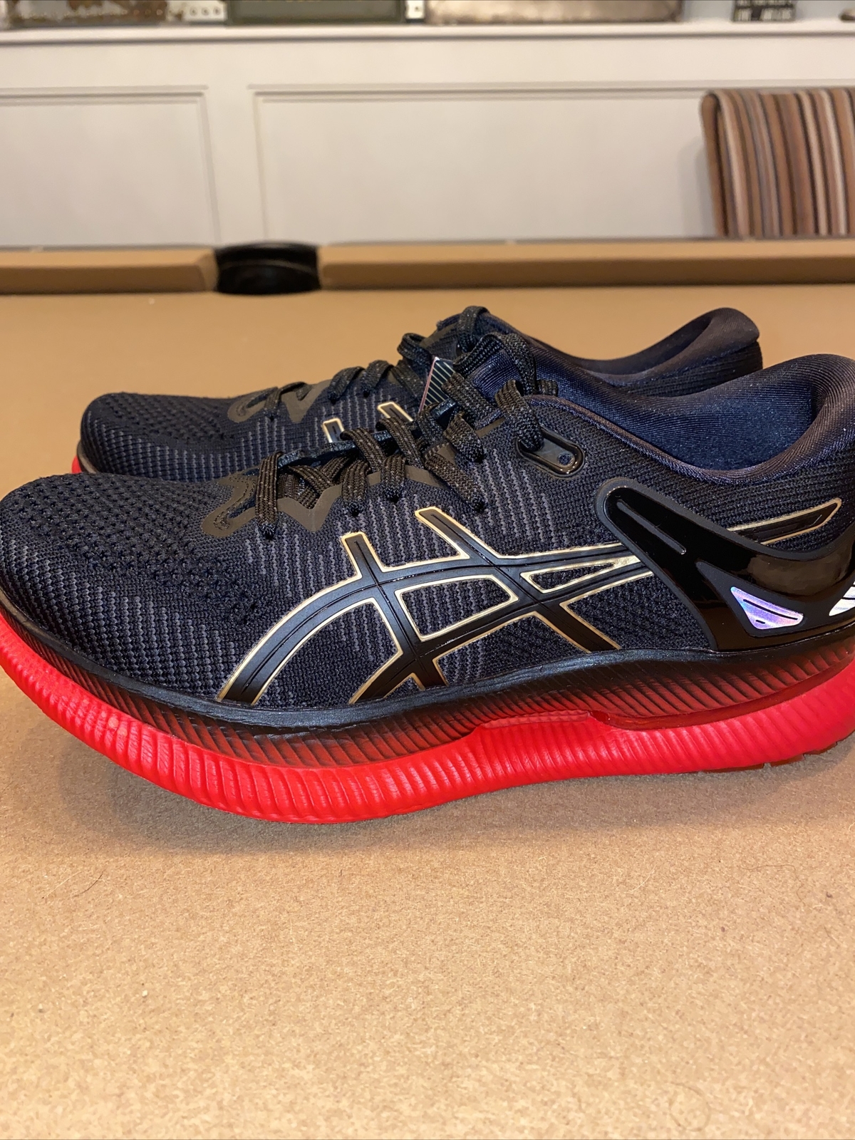 asics metaride black red