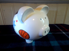 VINTAGE LARGE CERAMIC SPORTS PIGGY BANK 8 INCHES LONG.