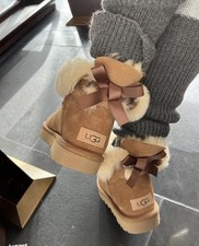 UGG Kids Mini Bailey Bow II boots in chestnut.