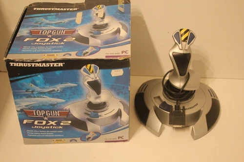 joystick top gun fox 2 thrustmaster pour pc avec sa boîte
