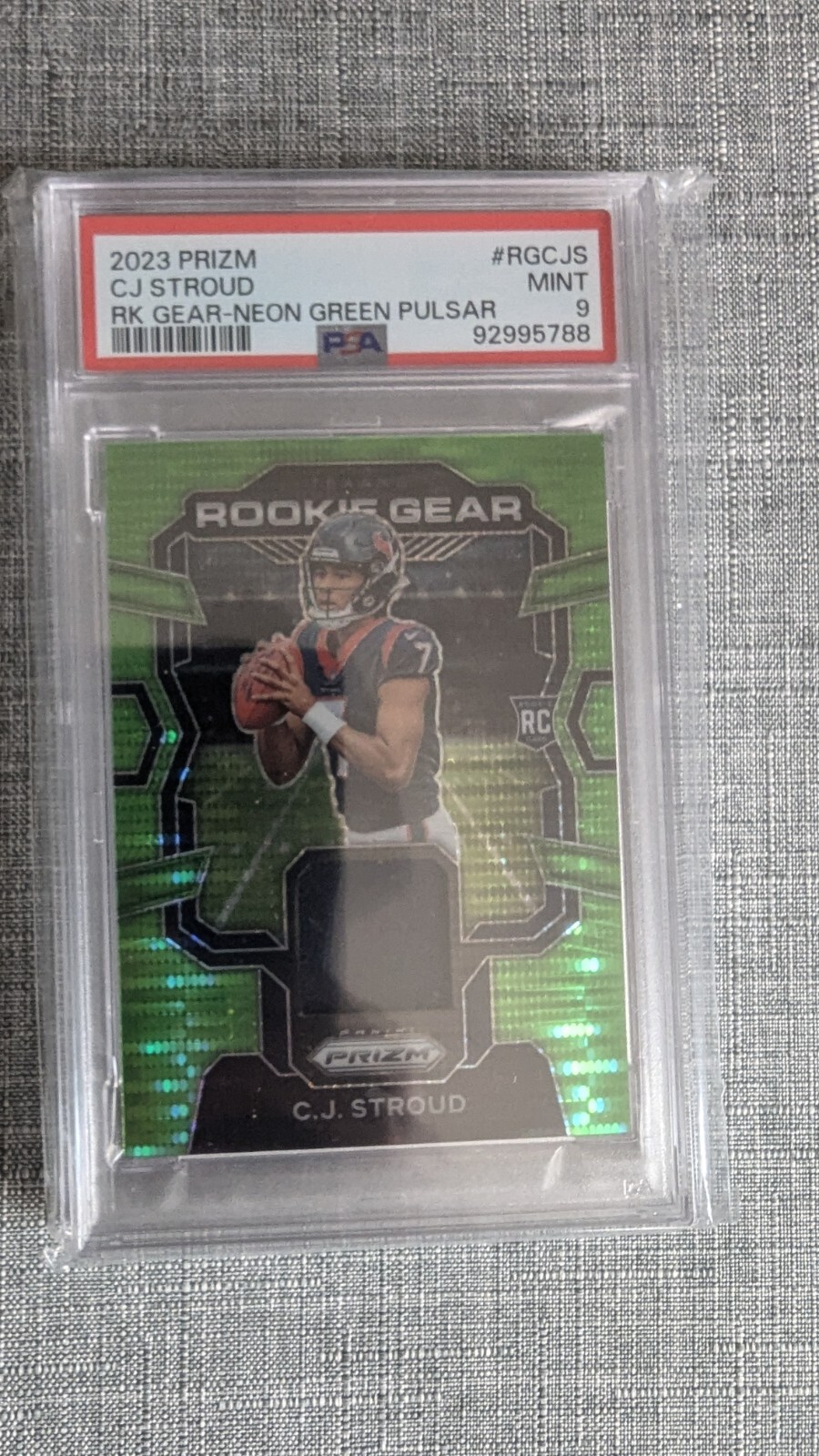 2023 Panini Prizm Rookie Gear #RGCJS CJ Stroud RK Gear-Neon Green Pulsar PSA 9