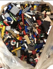 4 KG Lotto lego sfusi pezzi appartenenti a set vecchi