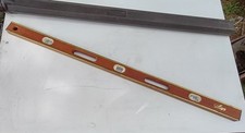 Vintage Mayes 48 inch wooden level with brass accents 
