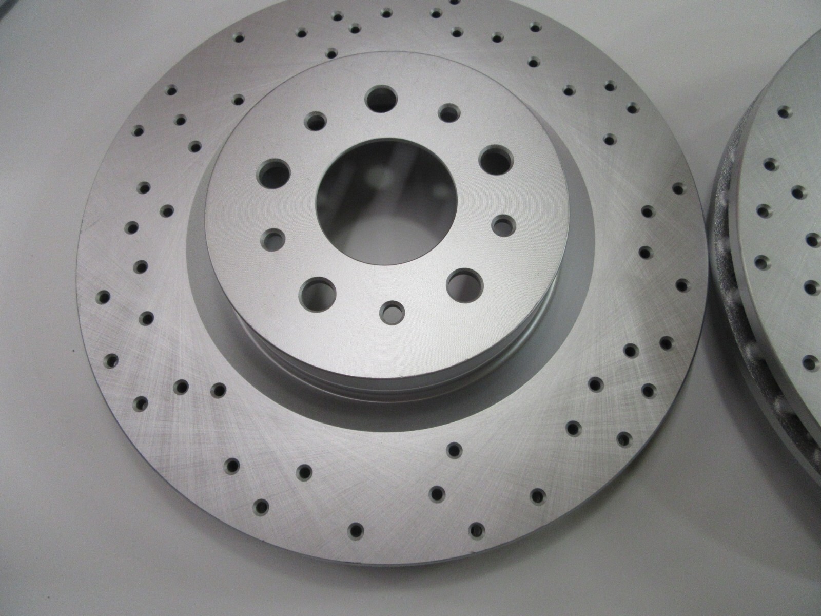 Maserati Quattroporte front brake pads & drilled rotors LOW DUST
