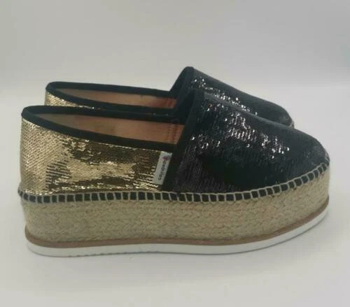 Scarpe da donna zeppe di oro