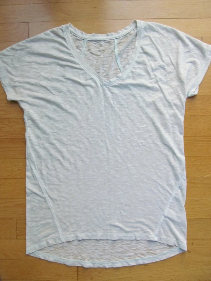 Ropa de entrenamiento atlética Athleta top y leggings cortos para mujer talla pequeña Foto 2 de 4