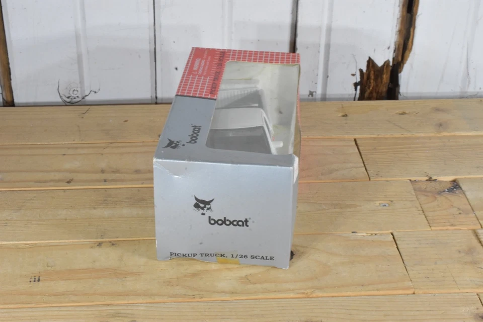 Camioneta de servicio ERTL BOBCAT DODGE RAM 1500 PICKUP EN CAJA 1/26 Foto 4 de 4