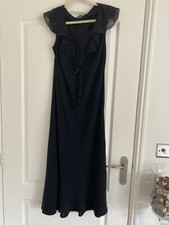 Planet Maxi  length black cocktail dress. Sheer Frill. Neck Detail. Size. Used.