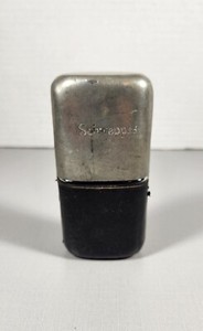 VINTAGE SCHWEPPES LEATHER & METAL GLASS BOTTLE