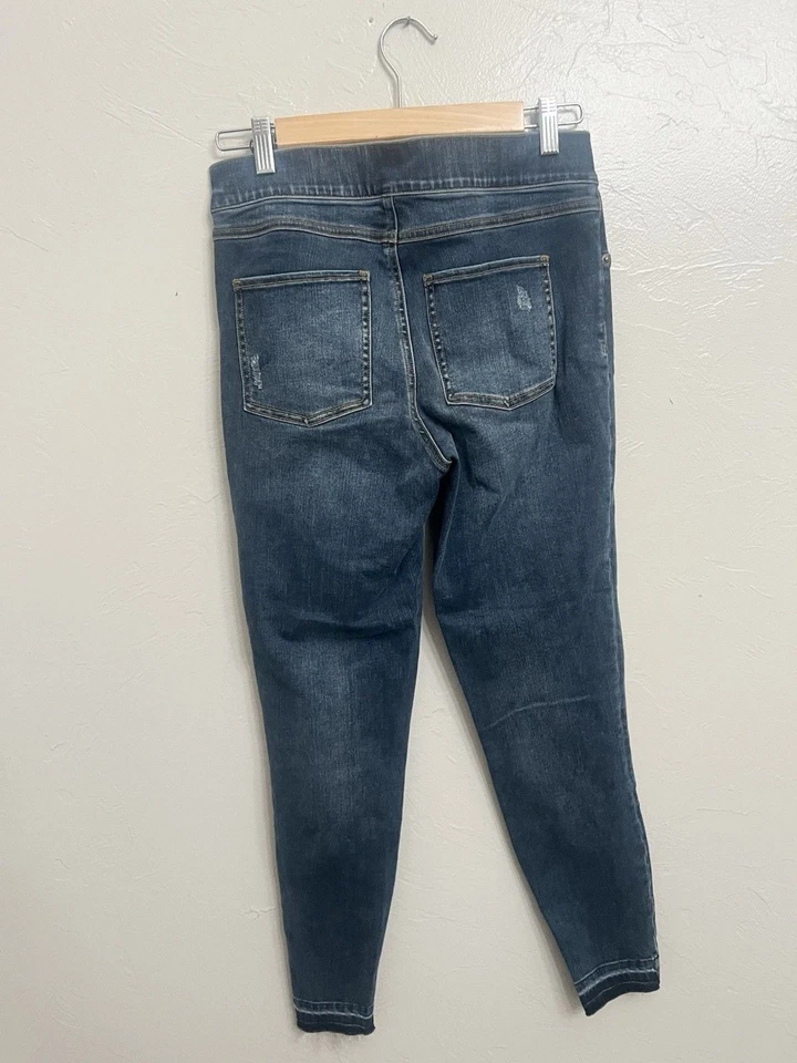 Pantalones de mezclilla ajustados Spanx desgastados al tobillo dobladillo crudo lavado pequeño desgastado Foto 4 de 4