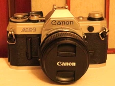 CANON AE-1 35mm SLR FILM CAMERA w/ FD 50mm 1:1.4 LENS MADE IN JAPAN