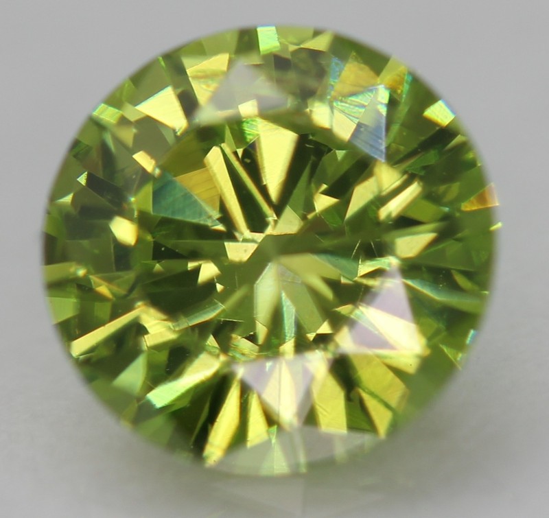 Cert 0.65 Carat Vivid Green VS1 Round Brilliant Natural Enhanced Diamond 5.68mm