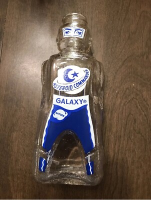 12 GALAXY SPACE FOODS SPACEMAN ASTRONAUT SODA SYRUP BOTTLE COIN