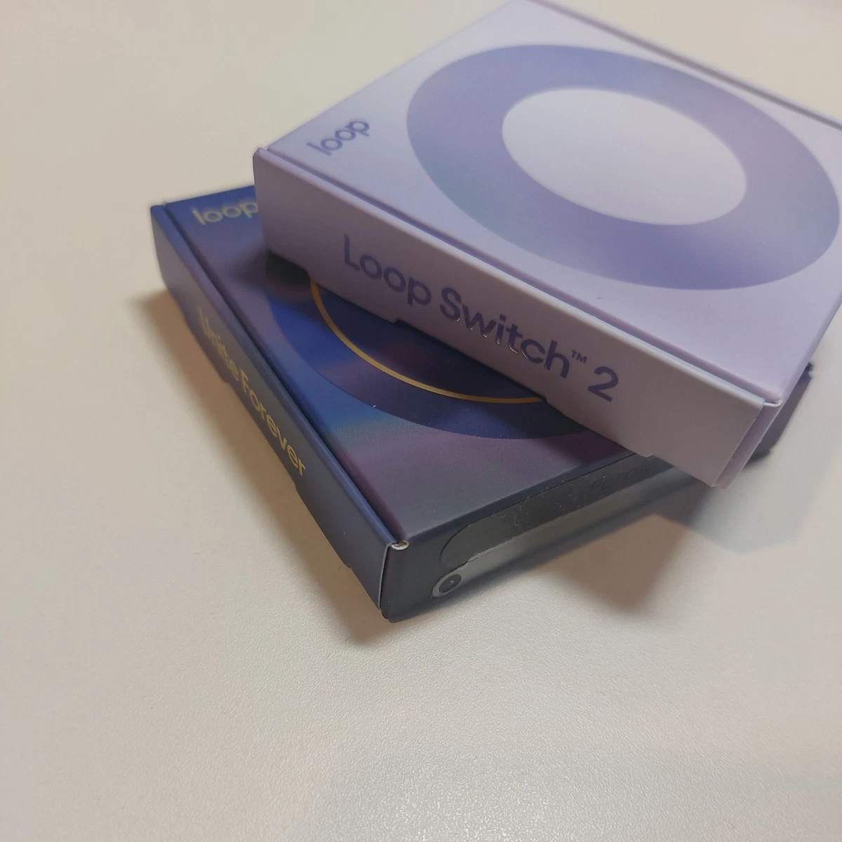 Paquete de 2 tapones para los oídos de bucle lavanda iridiscente y Tomorrowland púrpura NUEVO