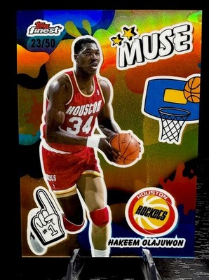 Hakeem Olajuwon 2025-26 Topps Finest Muse Refractor Insert #M-17 /50 Rockets