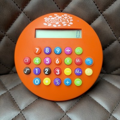 Vintage orange Nestle Smarties Taschenrechner 90er Jahre Werbung Sammlerstück