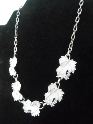 SARAH COVENTRY WHITE ENAMELED LEAVES SILVER BERRY CLUSTERS NECKLACE 16 INCHES L - Image 1 of 4