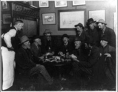 Still in the game,c1913,old men playing cards,Gamblers,Gambling,Chips,Money