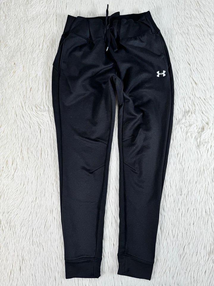 Pantalones deportivos Under Armour negros sueltos de pierna recta para mujer medianos altos Foto 3 de 4